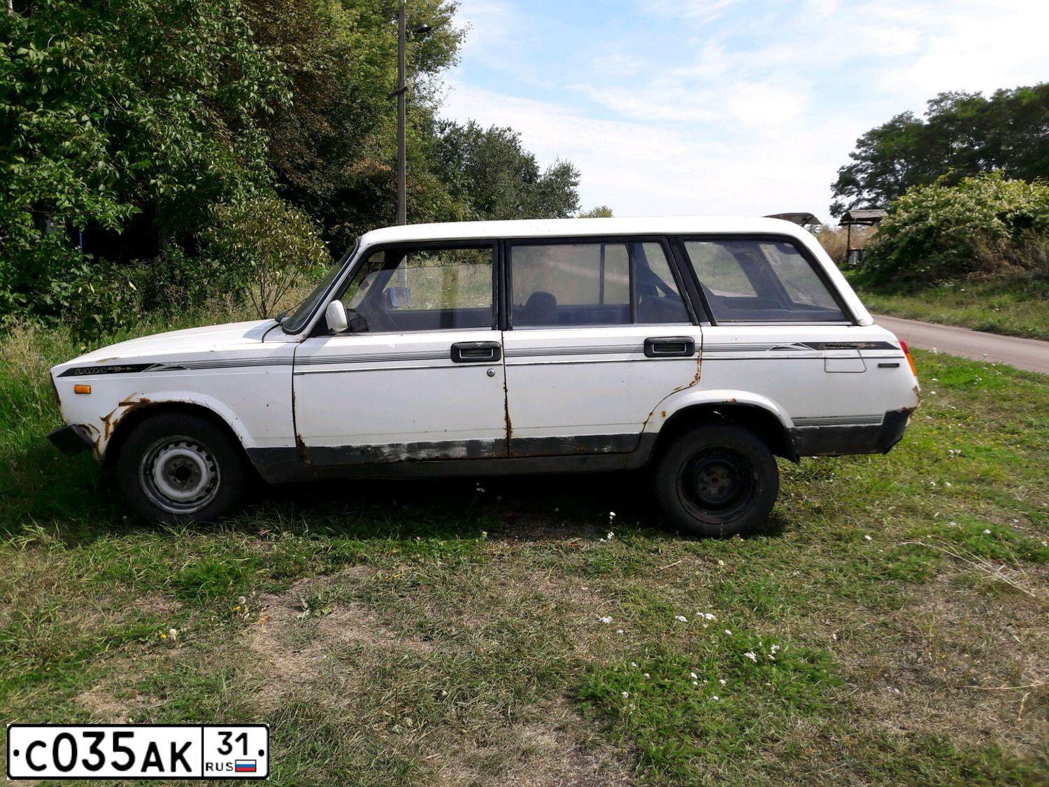 Фото автомобиля LADA 2104, 1994 — госномер С152УК50. Цвет: БЕЛЫЙ
