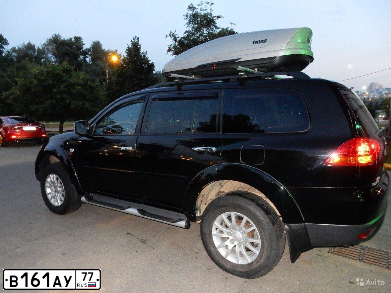 Фото автомобиля MITSUBISHI PAJERO SPORT, 2012 — госномер В161АУ77. Цвет: ЧЕРНЫЙ