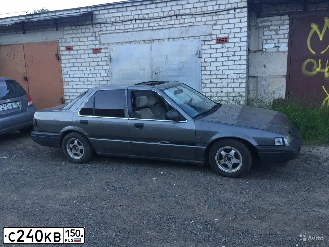 Фото автомобиля CHEVROLET AVEO, 2007 — госномер С240КВ150. Цвет: СЕРЫЙ