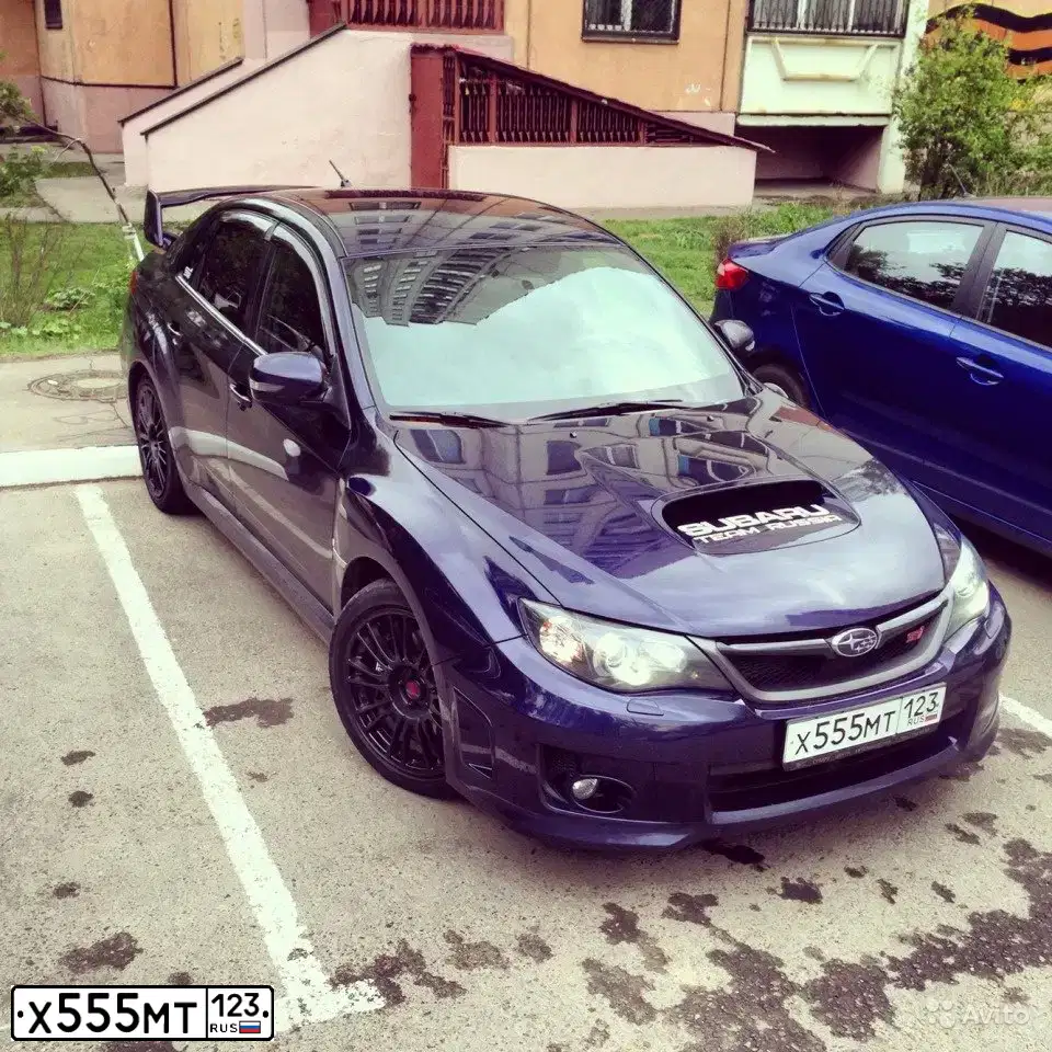 Фото автомобиля SUBARU IMPREZA, 2010 — госномер Х555МТ123. Цвет: синий