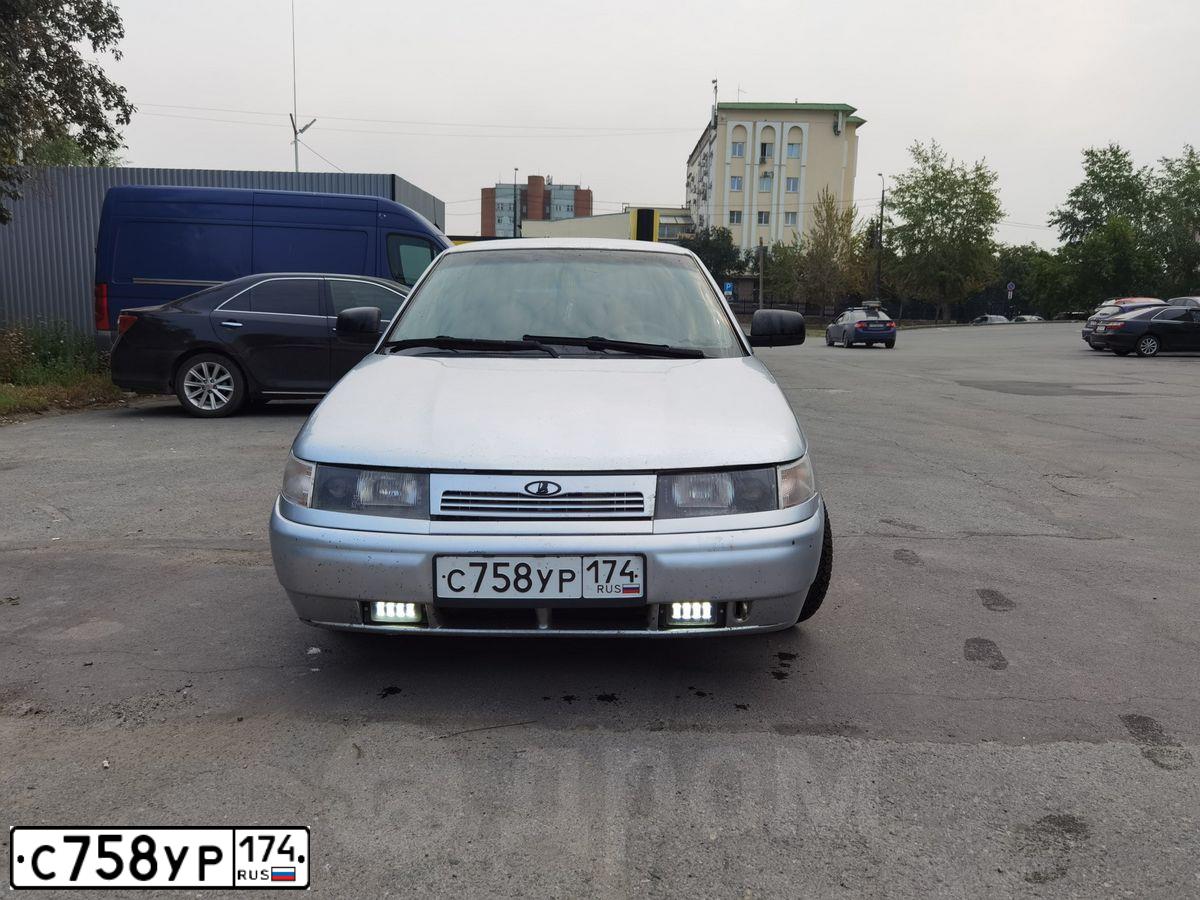 Фото автомобиля LADA 2112 LADA, 2006 — госномер С758УР174. Цвет: СЕРЕБРИСТЫЙ