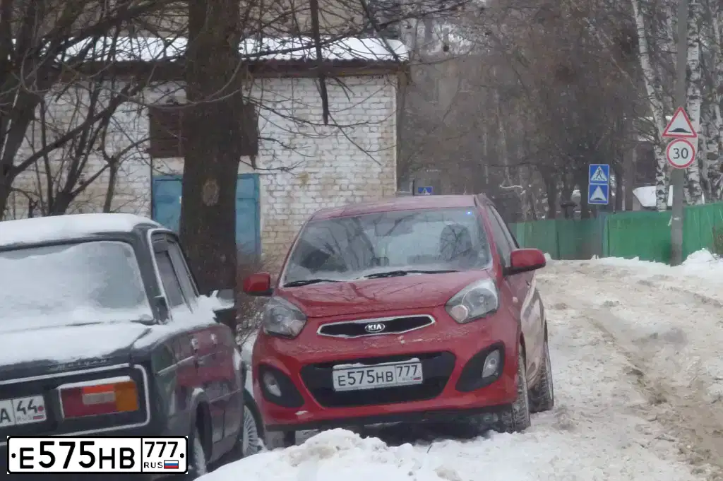 Фото автомобиля KIA RIO, 2016 — госномер Х216ТО76. Цвет: ЧЕРНЫЙ