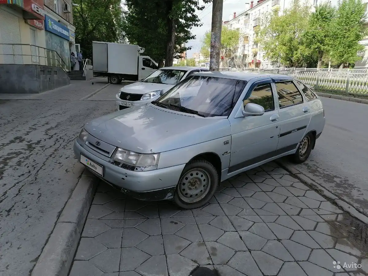 Фото автомобиля KIA RIO, 2012 — госномер В040КО12. Цвет: Серебристый
