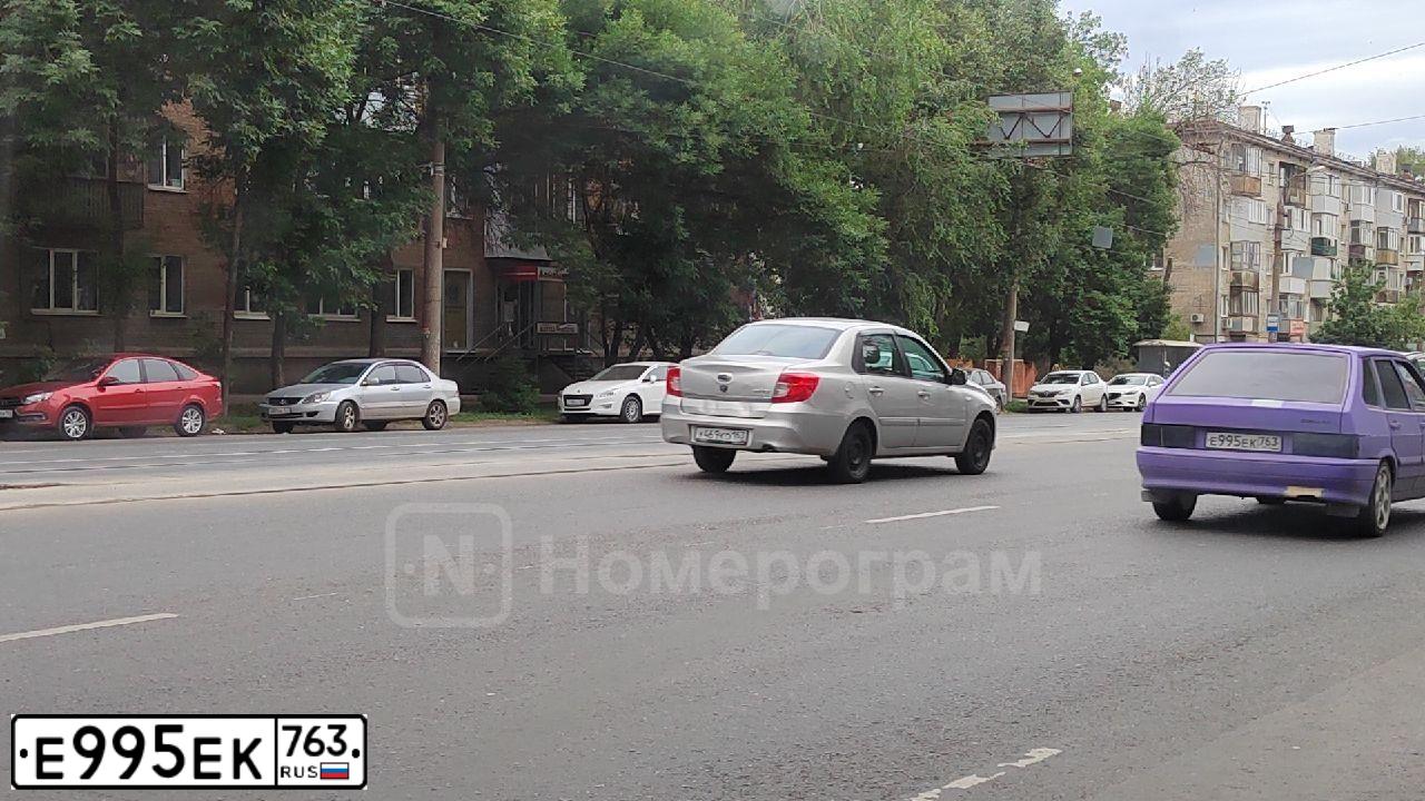 Фото автомобиля LADA 2114 SAMARA, 2009 — госномер Е995ЕК763. Цвет: ФИОЛЕТОВЫЙ