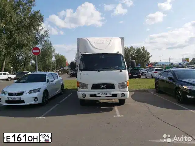 Фото автомобиля HYUNDAI MIGHTY, 2010 — госномер Т919ВТ774. Цвет: Белый