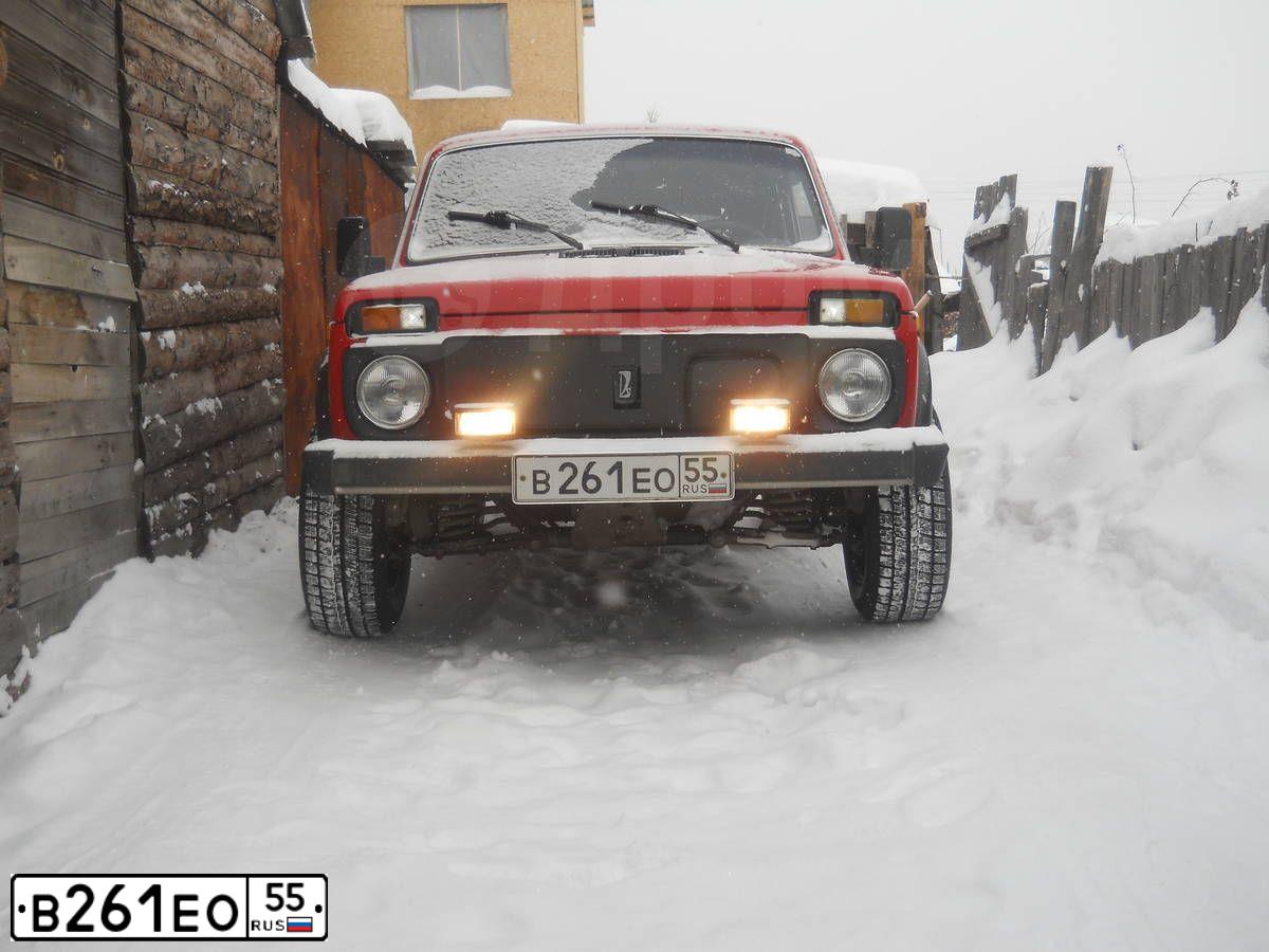 Фото автомобиля LADA 2121 NIVA, 1991 — госномер В261ЕО55. Цвет: Красный