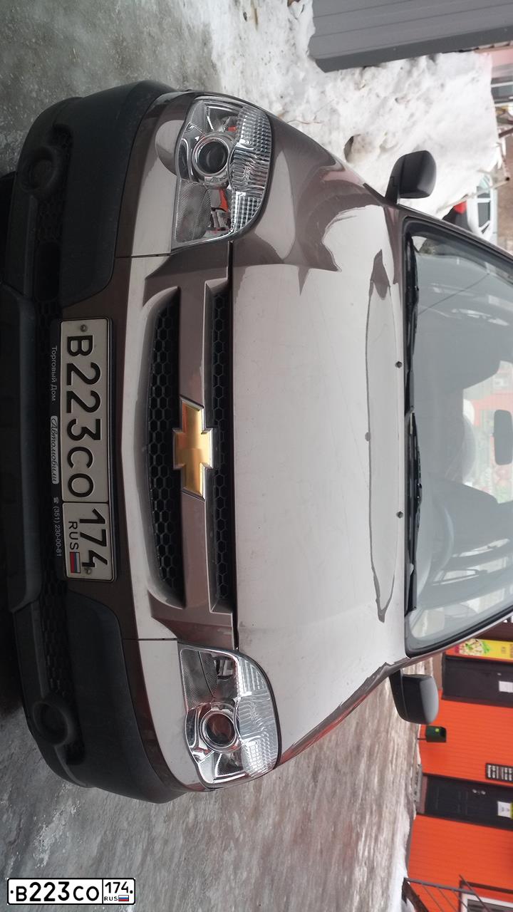Фото автомобиля CHEVROLET NIVA, 2014 — госномер В223СО174. Цвет: КОРИЧНЕВЫЙ