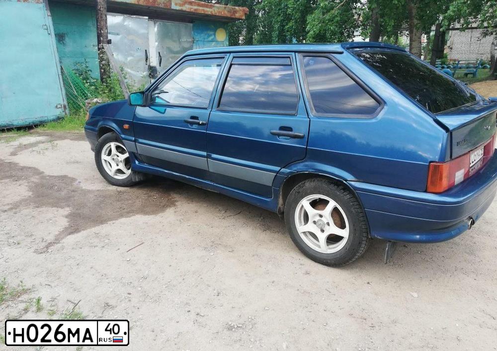 Фото автомобиля LADA 2114 SAMARA, 2005 — госномер Н354ЕВ40. Цвет: сине-зеленый