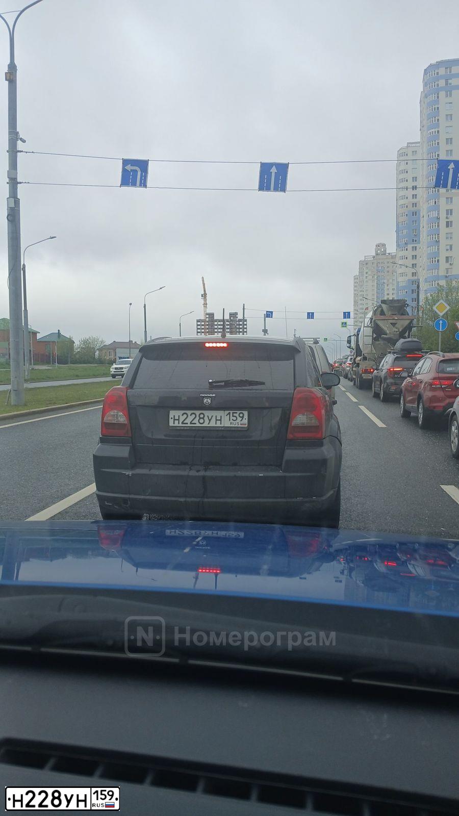 Фото автомобиля DODGE CALIBER, 2007 — госномер Т999АР59. Цвет: ЧЕРНЫЙ