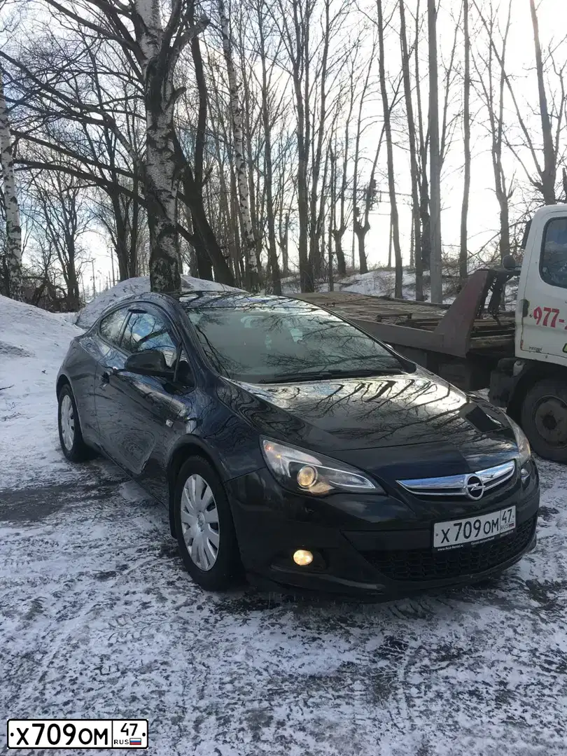 Фото автомобиля OPEL ASTRA, 2013 — госномер Х709ОМ47. Цвет: ЧЕРНЫЙ