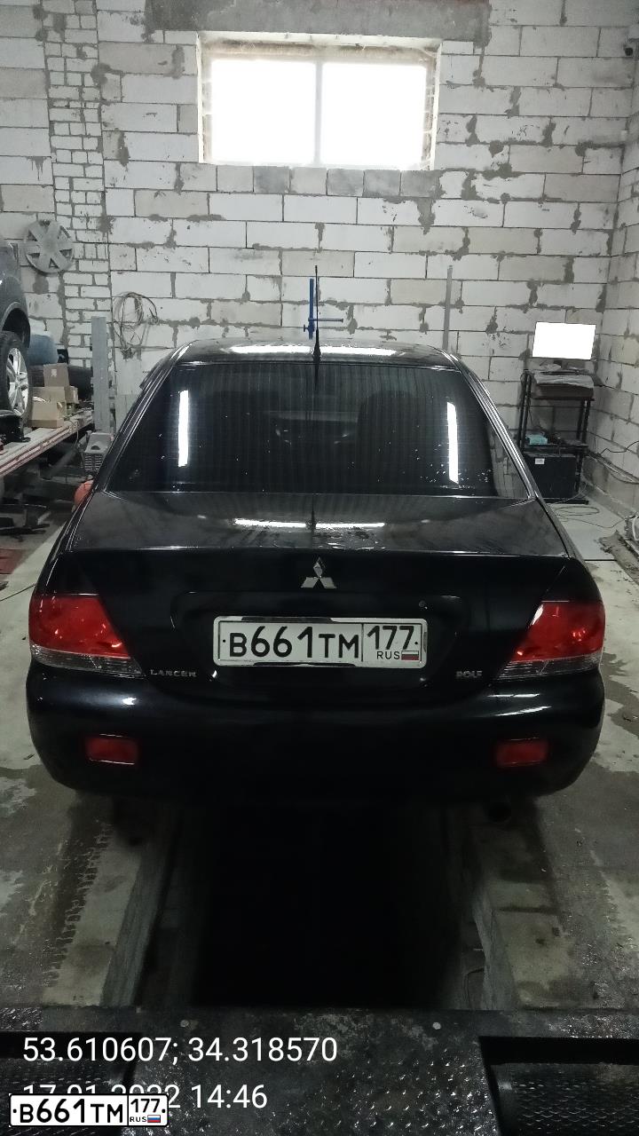 Фото автомобиля MITSUBISHI LANCER, 2007 — госномер В661ТМ177. Цвет: ЧЕРНЫЙ