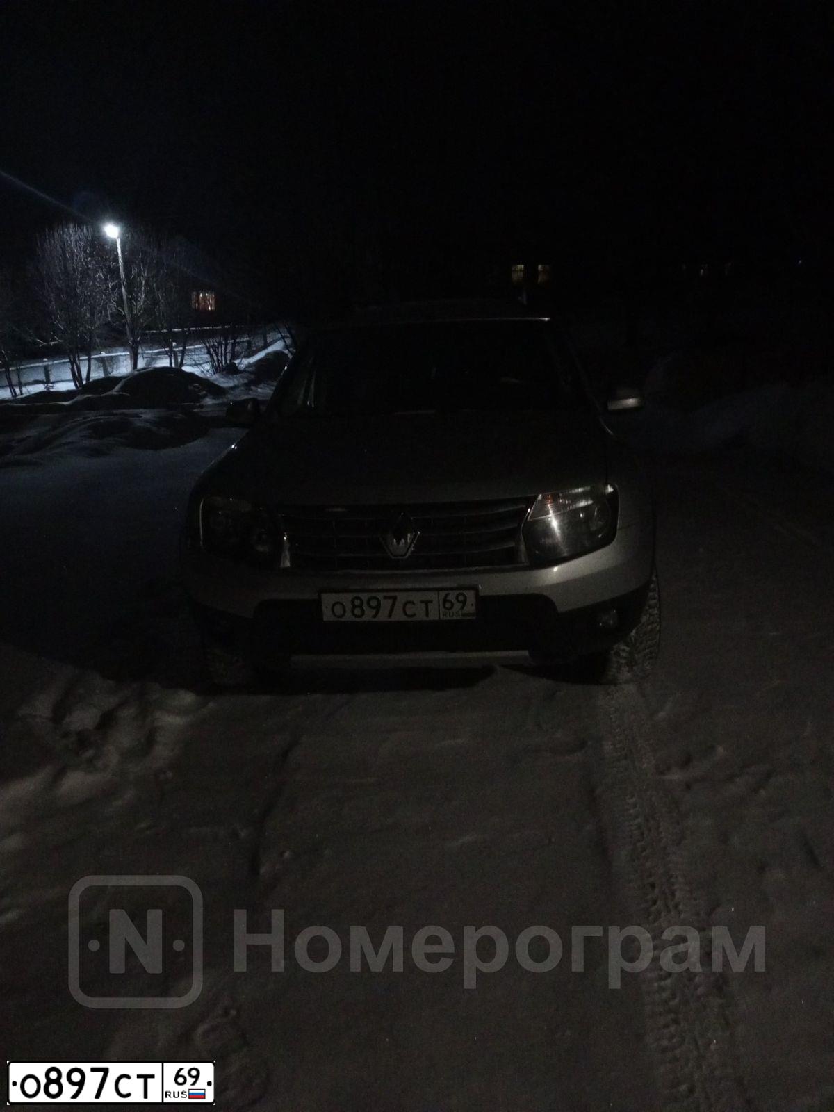 Фото автомобиля RENAULT DUSTER, 2013 — госномер Е975ТМ69. Цвет: СВЕТЛО-СЕРЫЙ
