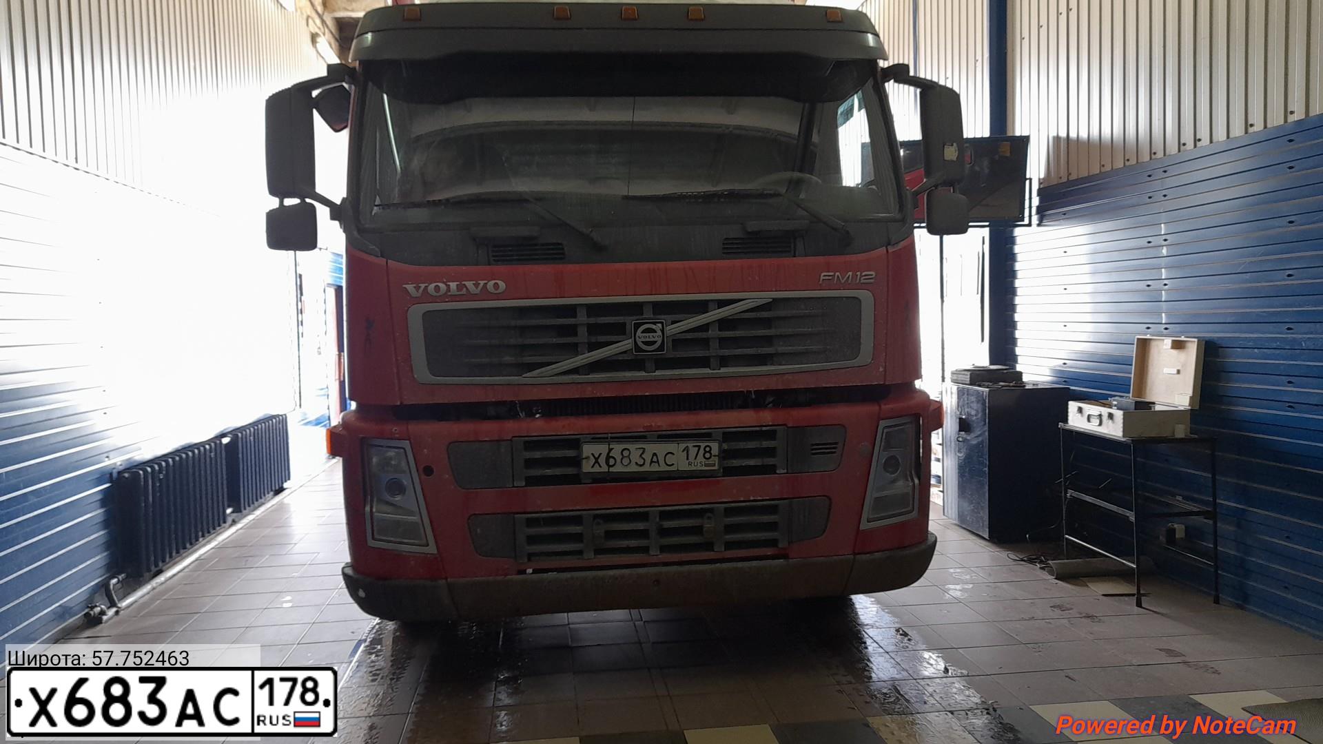 Фото автомобиля VOLVO SERIE FM /4X2/, 2004 — госномер Р170ТТ90. Цвет: Красный