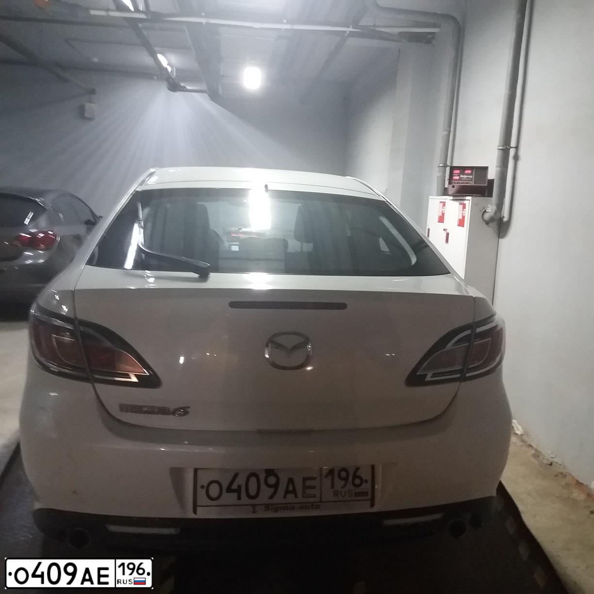 Фото автомобиля MAZDA 6, 2010 — госномер О409АЕ196. Цвет: Белый