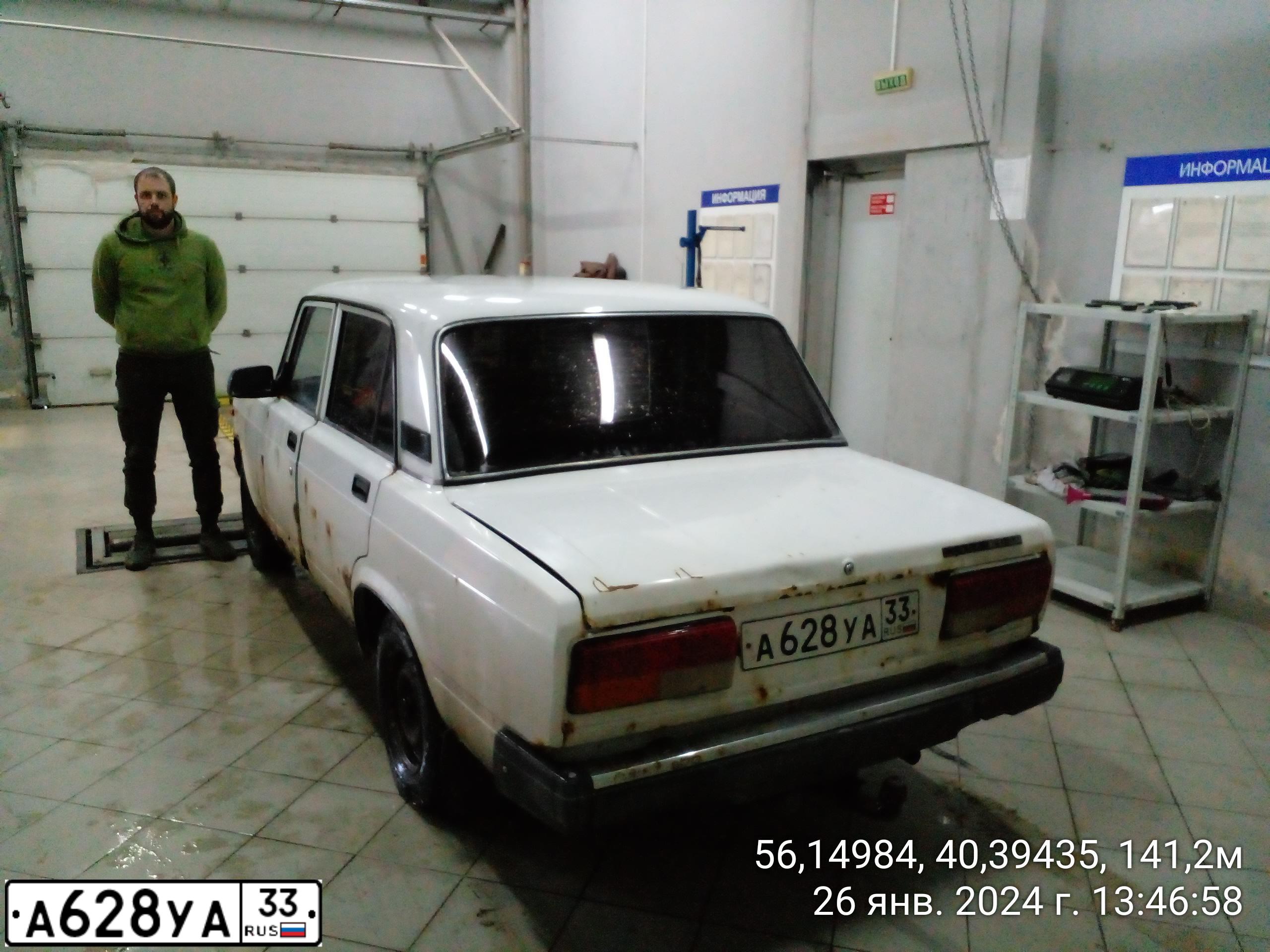 Фото автомобиля LADA 2107, 2010 — госномер Н123АУ977. Цвет: ЧЕРНЫЙ