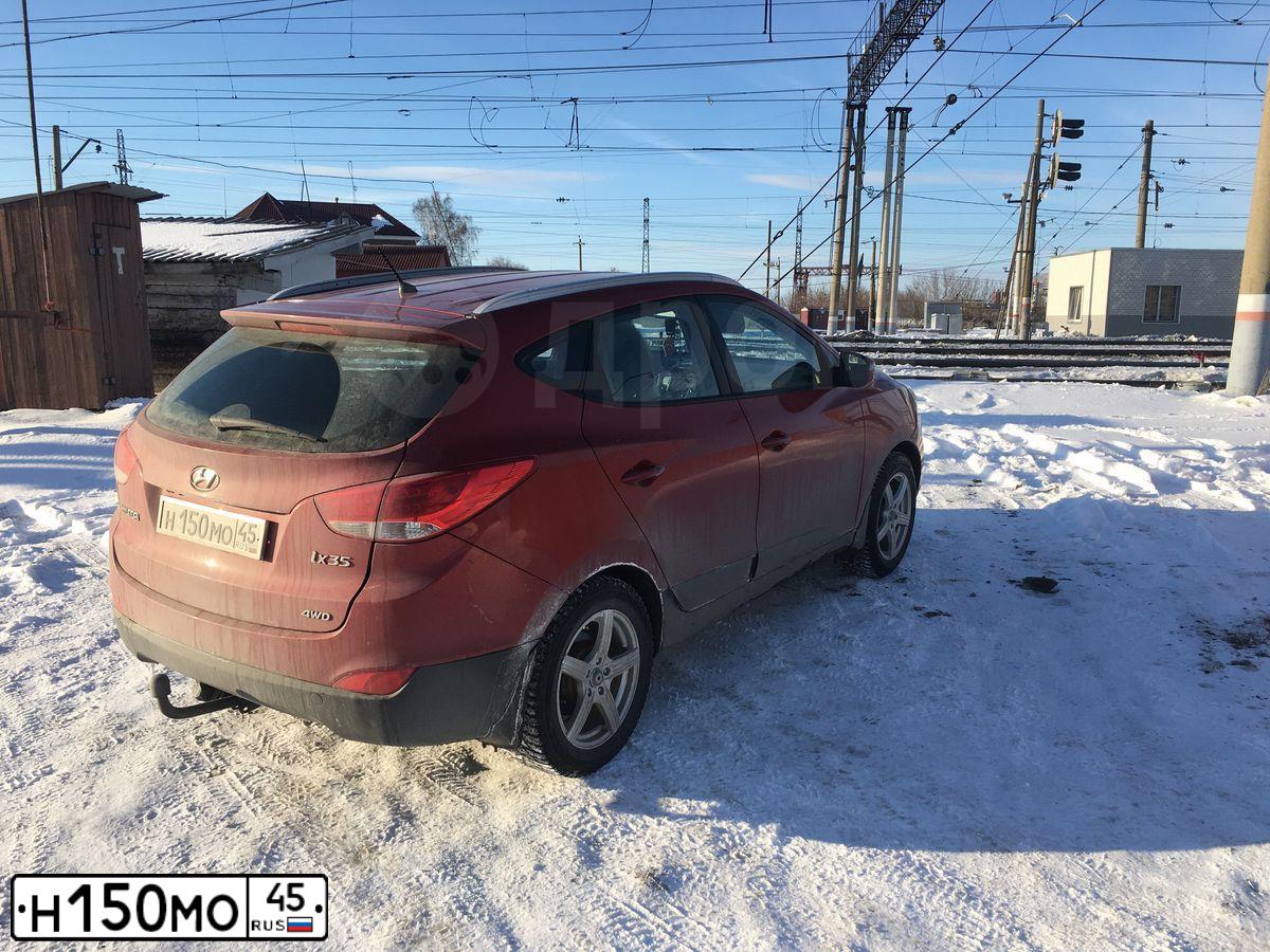 Фото автомобиля HYUNDAI IX35, 2011 — госномер К715НВ142. Цвет: Красный
