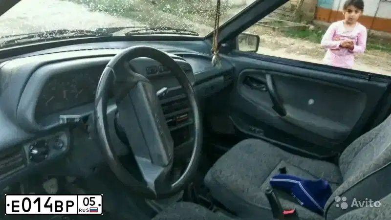 Фото автомобиля LADA 2114 SAMARA, 2007 — госномер Е014ВР05. Цвет: ГРАФИТОВЫЙ МЕТАЛЛИК