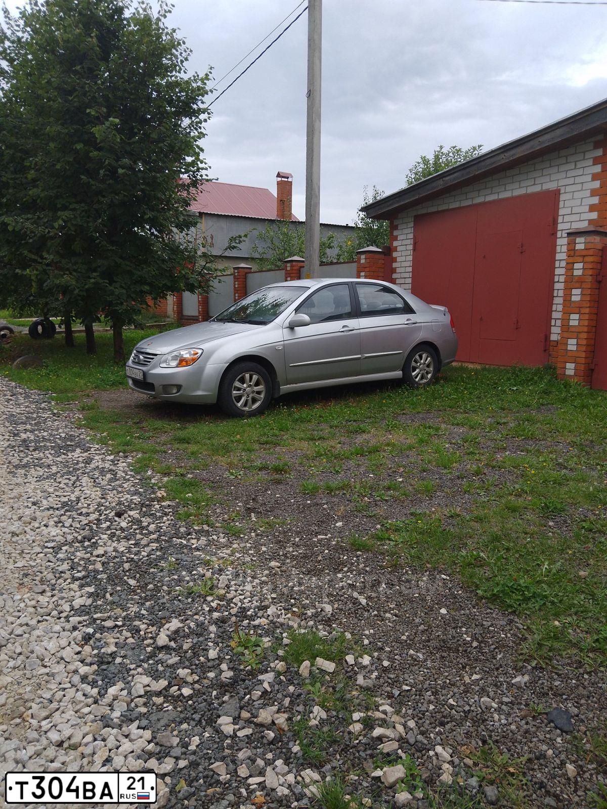 Фото автомобиля KIA CERATO, 2007 — госномер Т304ВА21. Цвет: Серебристый