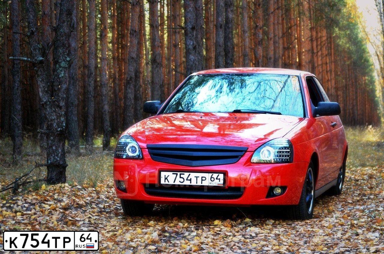 Фото автомобиля LADA 2112, 2007 — госномер К754ТР64. Цвет: ЯРКО-КРАСНЫЙ