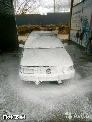 Фото автомобиля VOLKSWAGEN PASSAT, 1990 — госномер Н106ОХ99. Цвет: ЧЕРНЫЙ