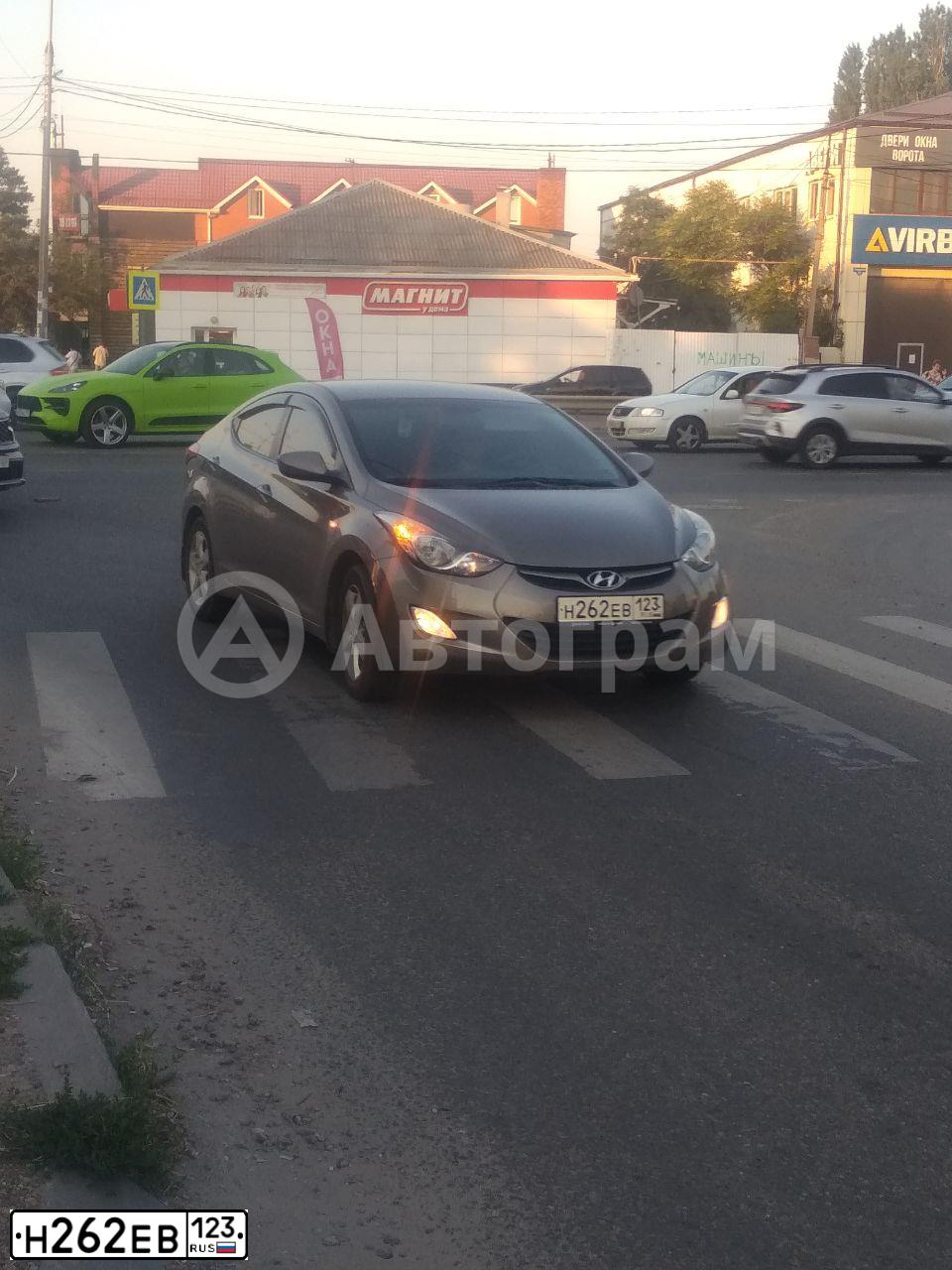 Фото автомобиля HYUNDAI ELANTRA, 2011 — госномер Н262ЕВ123. Цвет: БРОНЗОВЫЙ
