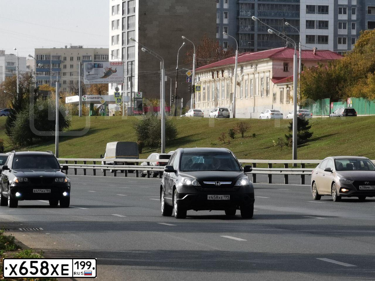 Фото автомобиля HONDA CR-V, 2008 — госномер Е034ЕР702. Цвет: ТЕМНО-СЕРЫЙ