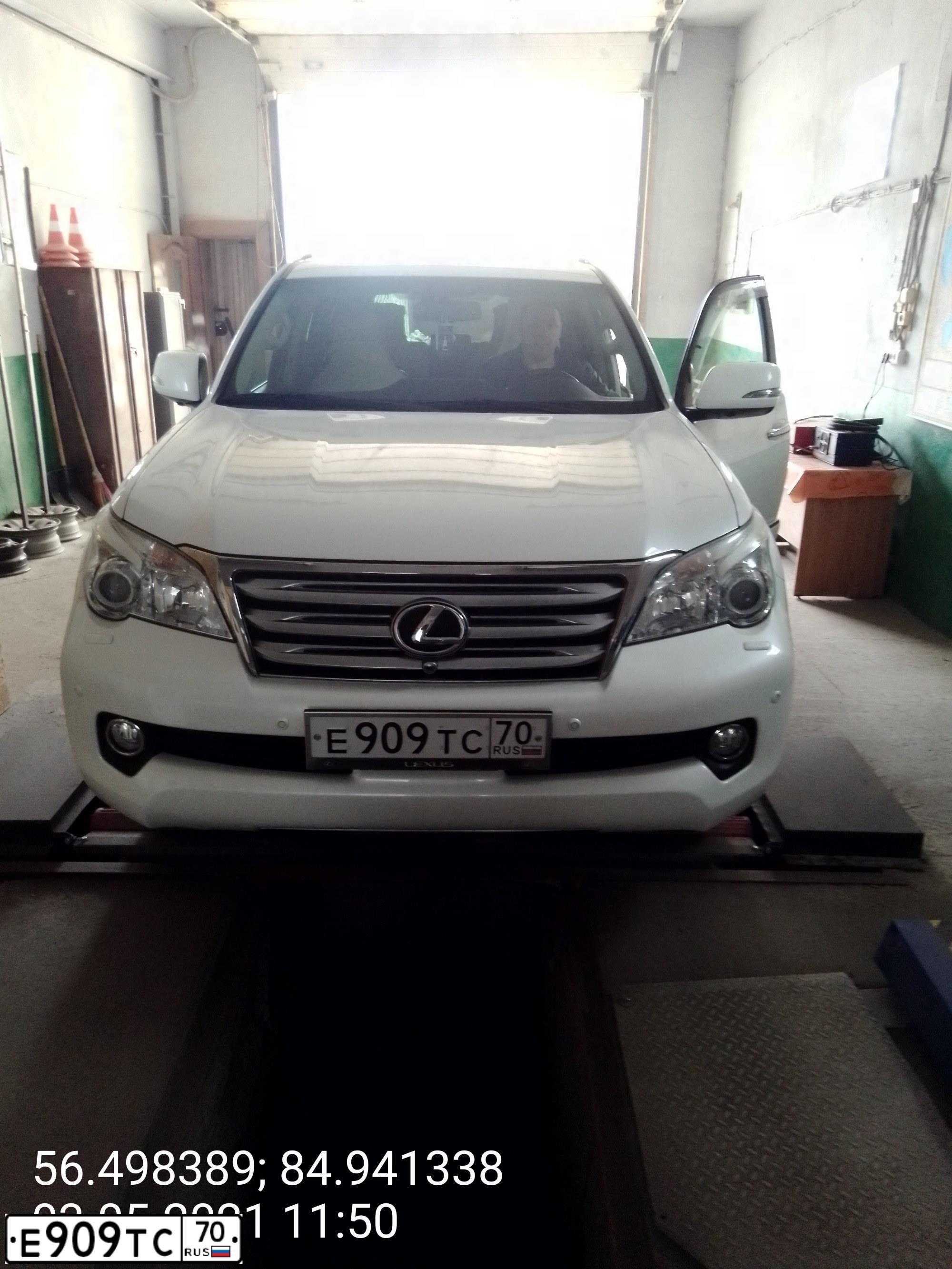 Фото автомобиля TOYOTA LANDCRUISER, 2008 — госномер Е296ЕУ70. Цвет: ЧЕРНЫЙ