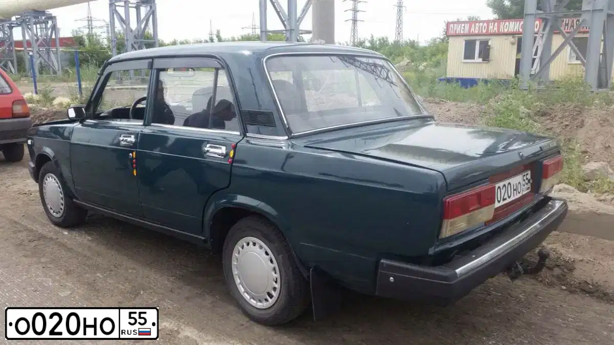Фото автомобиля LADA 2104, 1992 — госномер О020НО55. Цвет: Красный