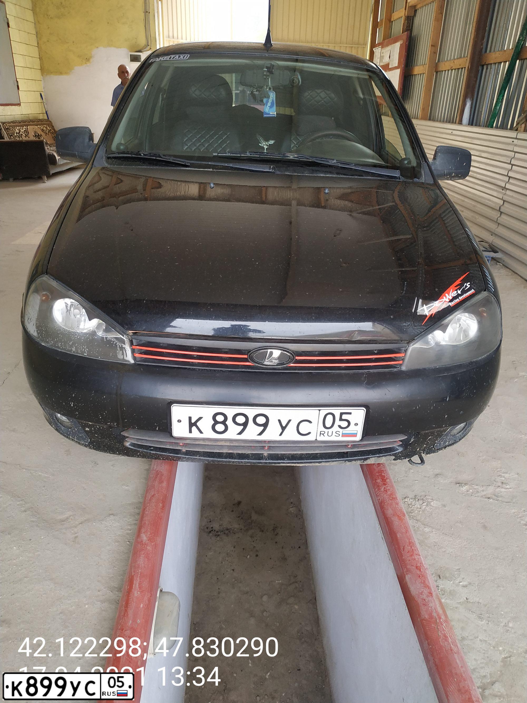 Фото автомобиля LADA 1119 KALINA, 2010 — госномер К899УС05. Цвет: СИНЕ-ЧЕРНЫЙ