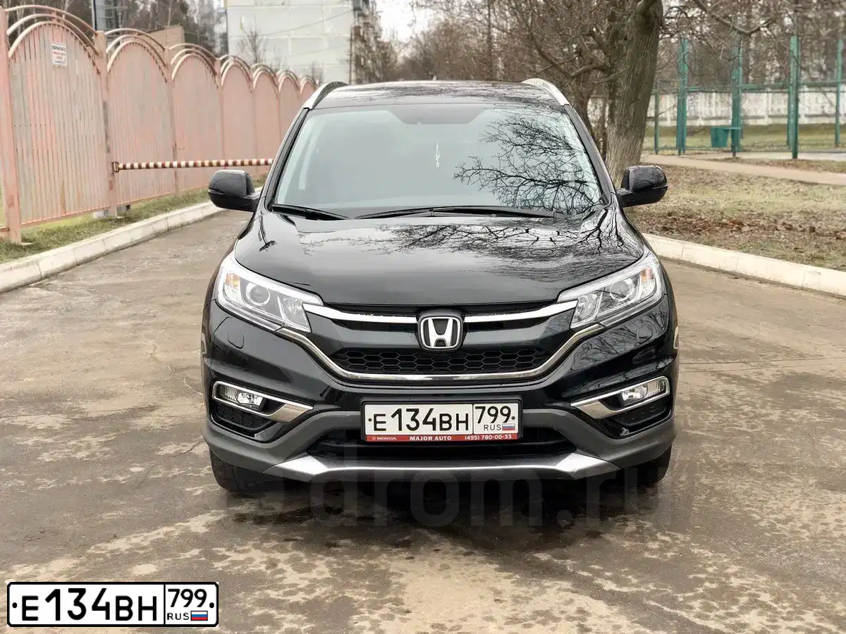 Фото автомобиля HONDA CR-V, 2017 — госномер Е134ВН799. Цвет: ЧЕРНЫЙ