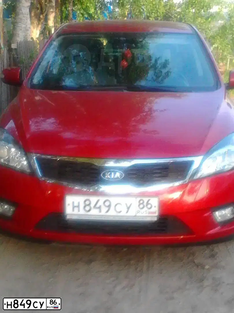 Фото автомобиля KIA CERATO, 2005 — госномер А107СР186. Цвет: СИНИЙ