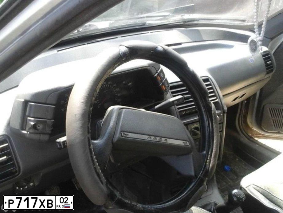 Фото автомобиля LADA 2112, 2003 — госномер Р717ХВ02. Цвет: СВЕТЛО-СЕРЕБРИСТЫЙ МЕТАЛЛ