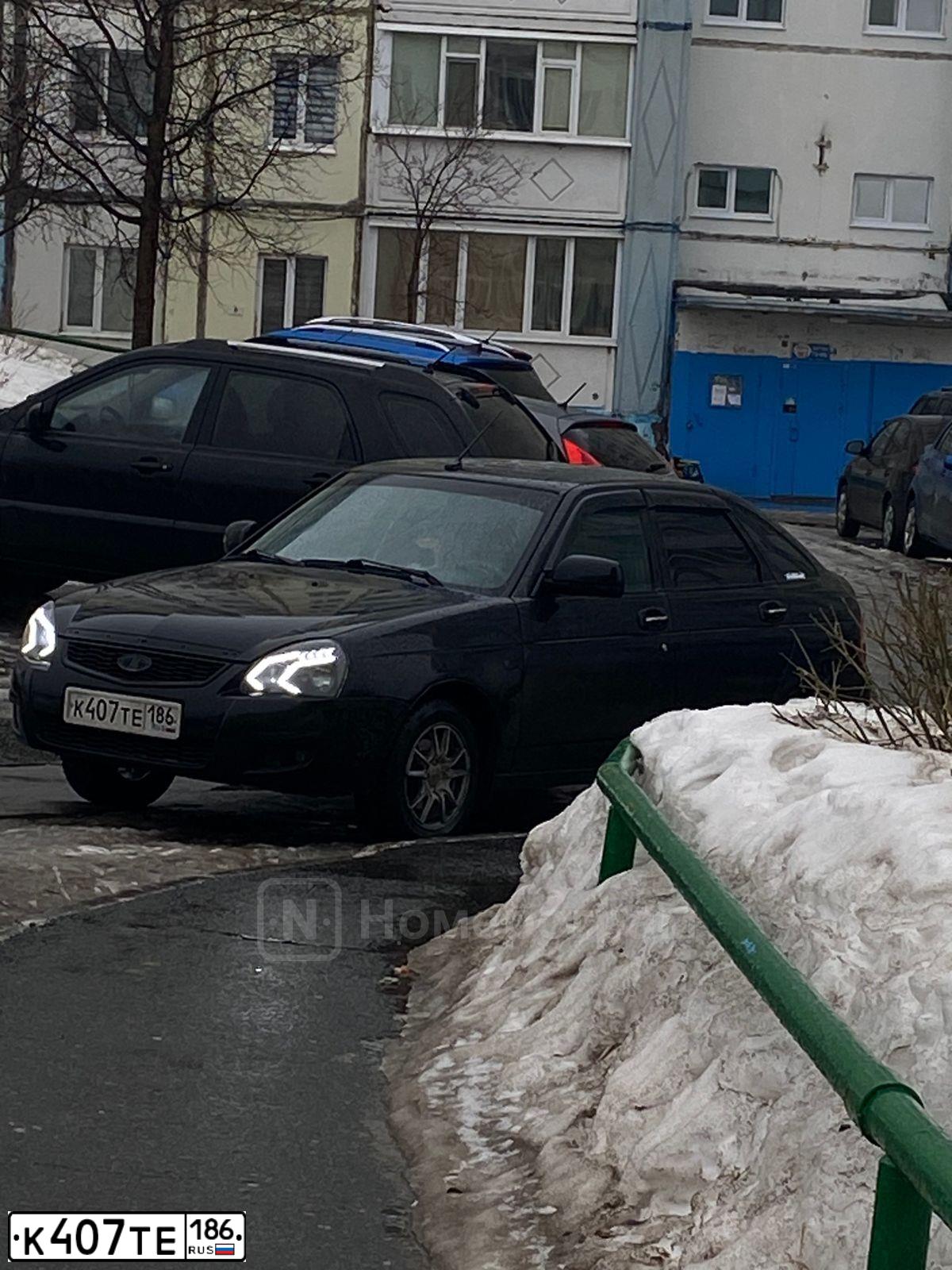 Фото автомобиля LADA 2172 PRIORA, 2012 — госномер К407ТЕ186. Цвет: Сине-Черный