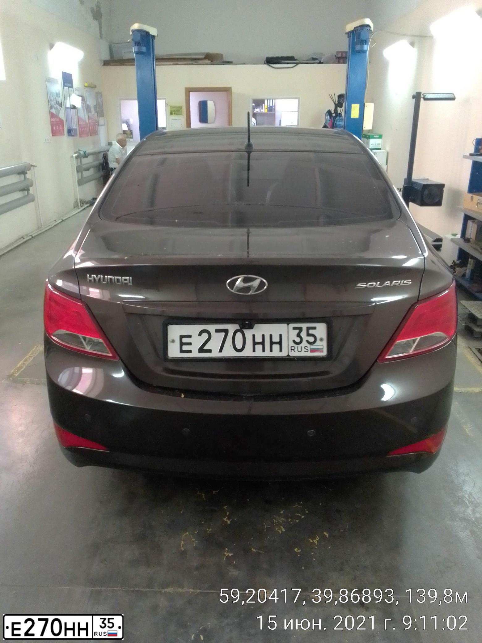 Фото автомобиля HYUNDAI SOLARIS, 2014 — госномер Е270НН35. Цвет: Коричневый