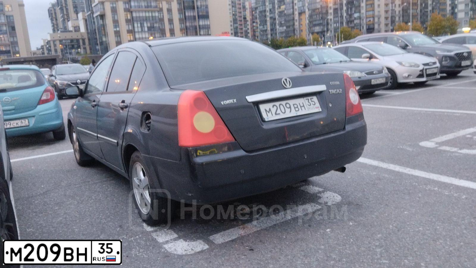 Фото автомобиля TAGAZ VORTEX ESTINA, 2009 — госномер М209ВН35. Цвет: ЧЕРНЫЙ