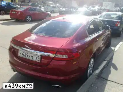 Фото автомобиля JAGUAR XF-SERIE, 2008 — госномер К043НН198. Цвет: ВИШНЕВЫЙ
