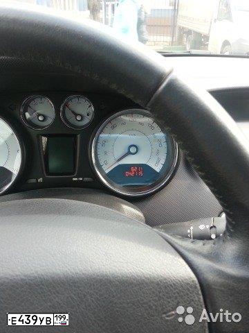 Фото автомобиля PEUGEOT 308, 2009 — госномер Е439УВ199. Цвет: БЕЛЫЙ