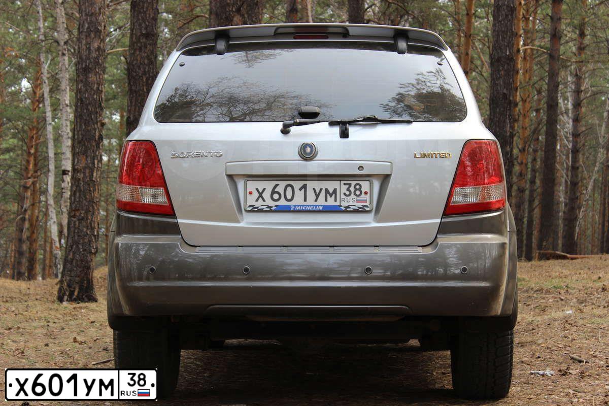 Фото автомобиля MITSUBISHI PAJERO SPORT, 2013 — госномер Х601УМ38. Цвет: СЕРЫЙ