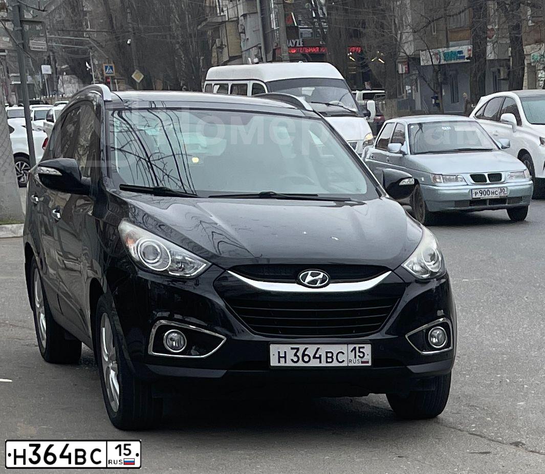 Фото автомобиля HYUNDAI IX35, 2013 — госномер Н364ВС15. Цвет: ЧЕРНЫЙ