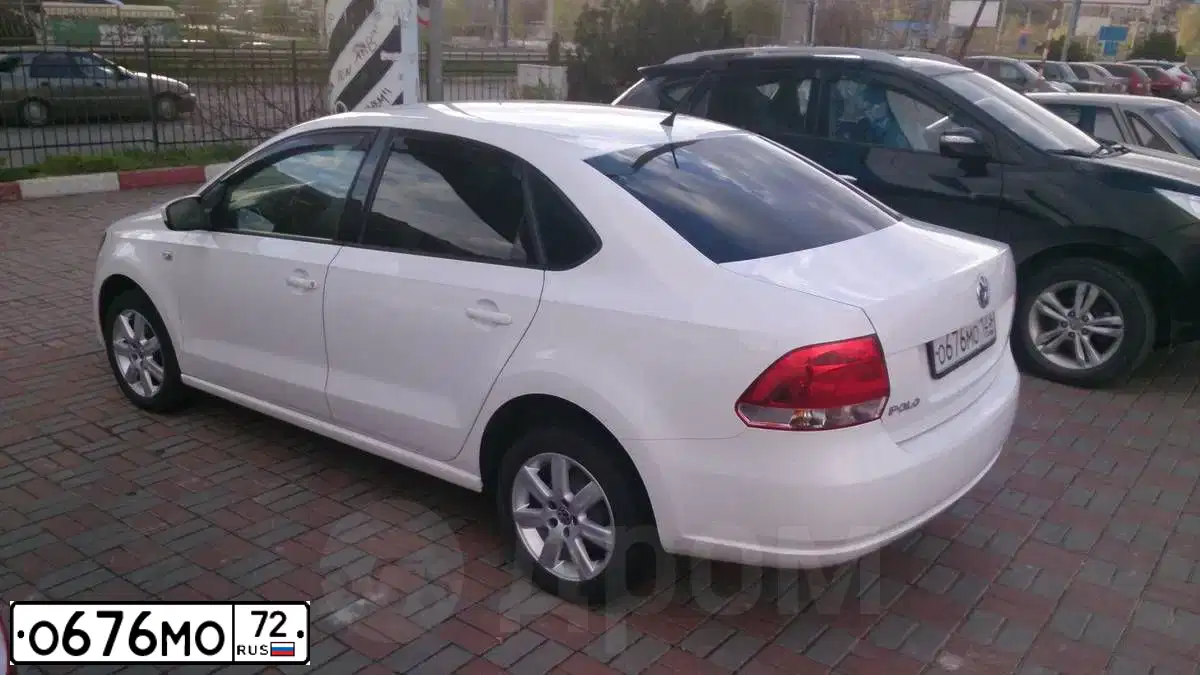 Фото автомобиля SKODA OCTAVIA, 2012 — госномер Х969СЕ154. Цвет: синий
