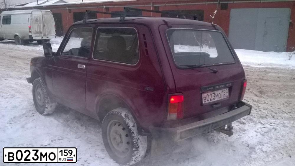 Фото автомобиля LADA 2121 NIVA, 2002 — госномер В023МО159. Цвет: ТЕМНО-БОРДОВЫЙ