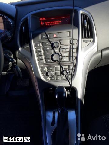 Фото автомобиля OPEL ASTRA, 2014 — госномер К345НМ799. Цвет: БЕЛЫЙ