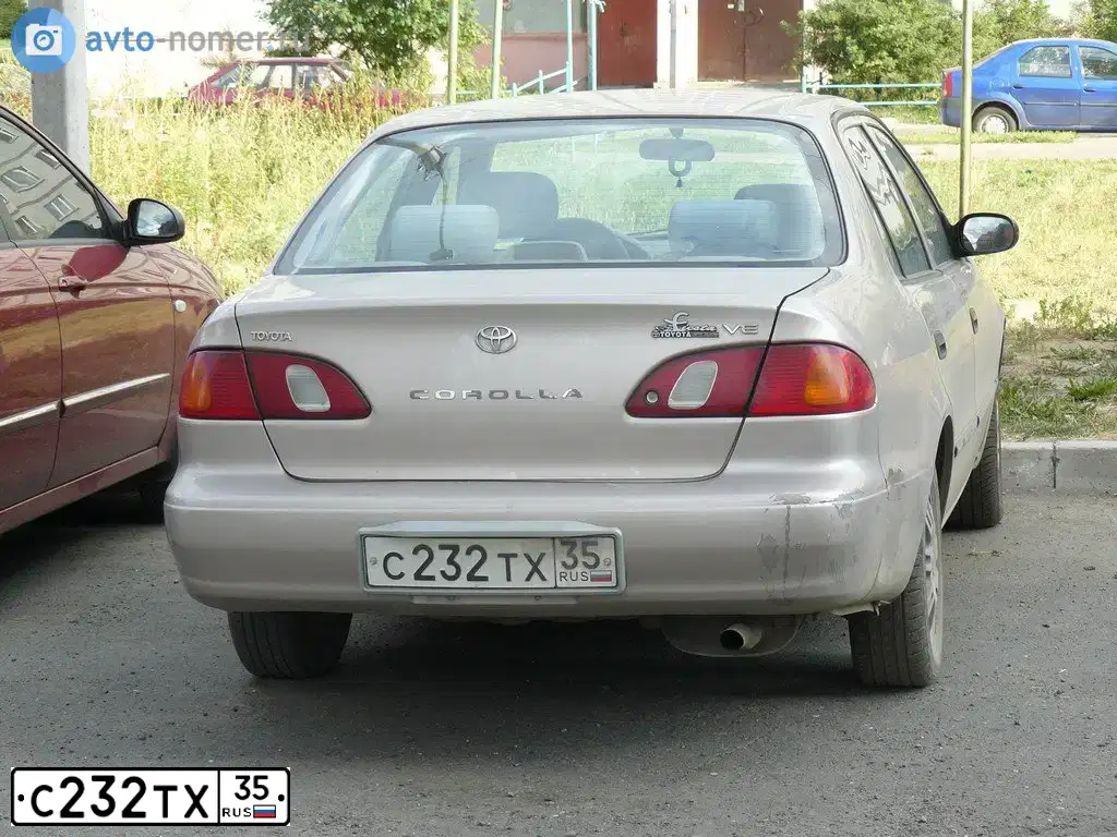 Фото автомобиля TOYOTA COROLLA, 1999 — госномер В962ХК35. Цвет: СЕРЫЙ