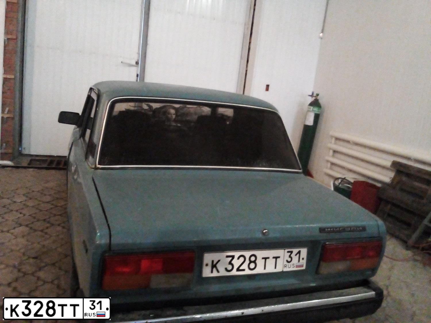 Фото автомобиля LADA 2107, 2004 — госномер О411РК46. Цвет: СЕРО-СИНИЙ