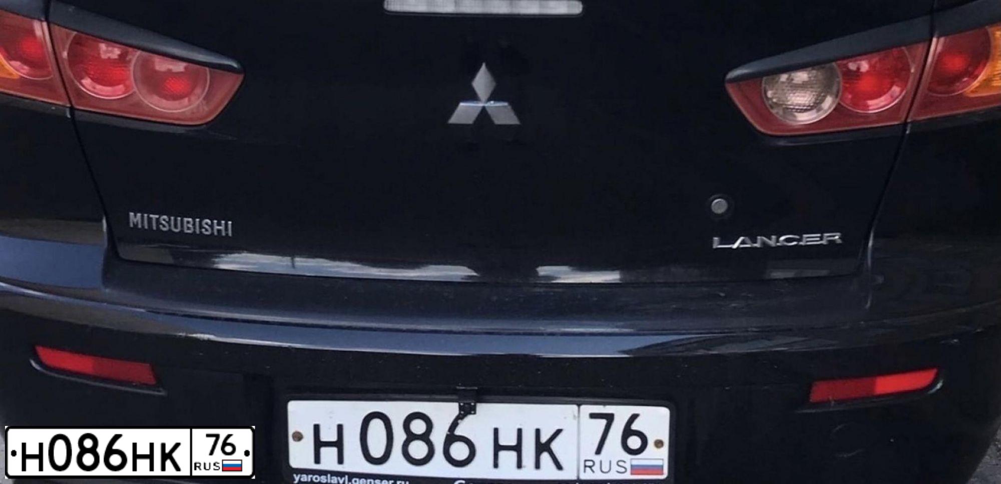 Фото автомобиля MITSUBISHI LANCER, 2007 — госномер Н086НК76. Цвет: ЧЕРНЫЙ