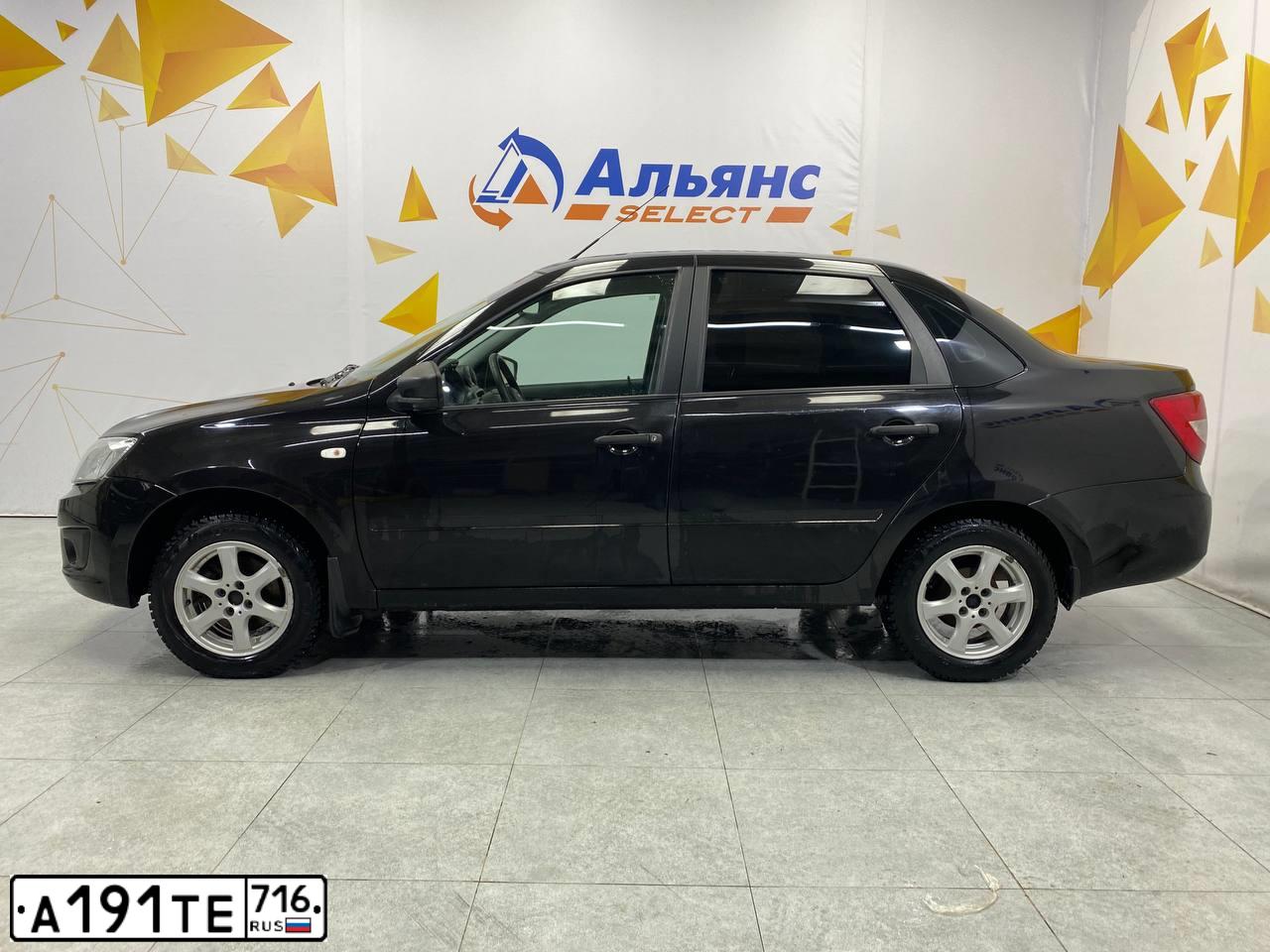 Фото автомобиля LADA 2190 GRANTA, 2018 — госномер Н291ЕР21. Цвет: ЧЕРНЫЙ