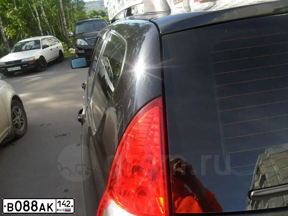 Фото автомобиля LADA 2171 PRIORA, 2010 — госномер О555УА42. Цвет: Сине-Черный