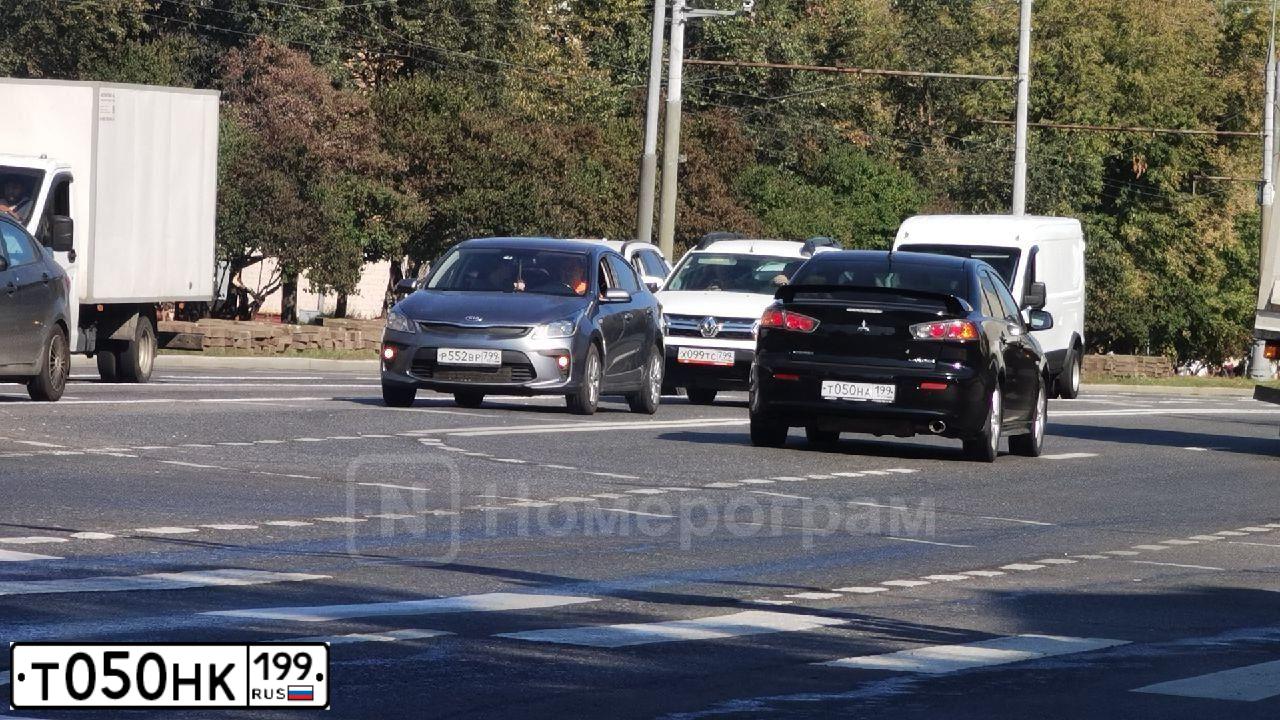 Фото автомобиля MITSUBISHI LANCER, 2008 — госномер О357РЕ761. Цвет: СЕРЫЙ