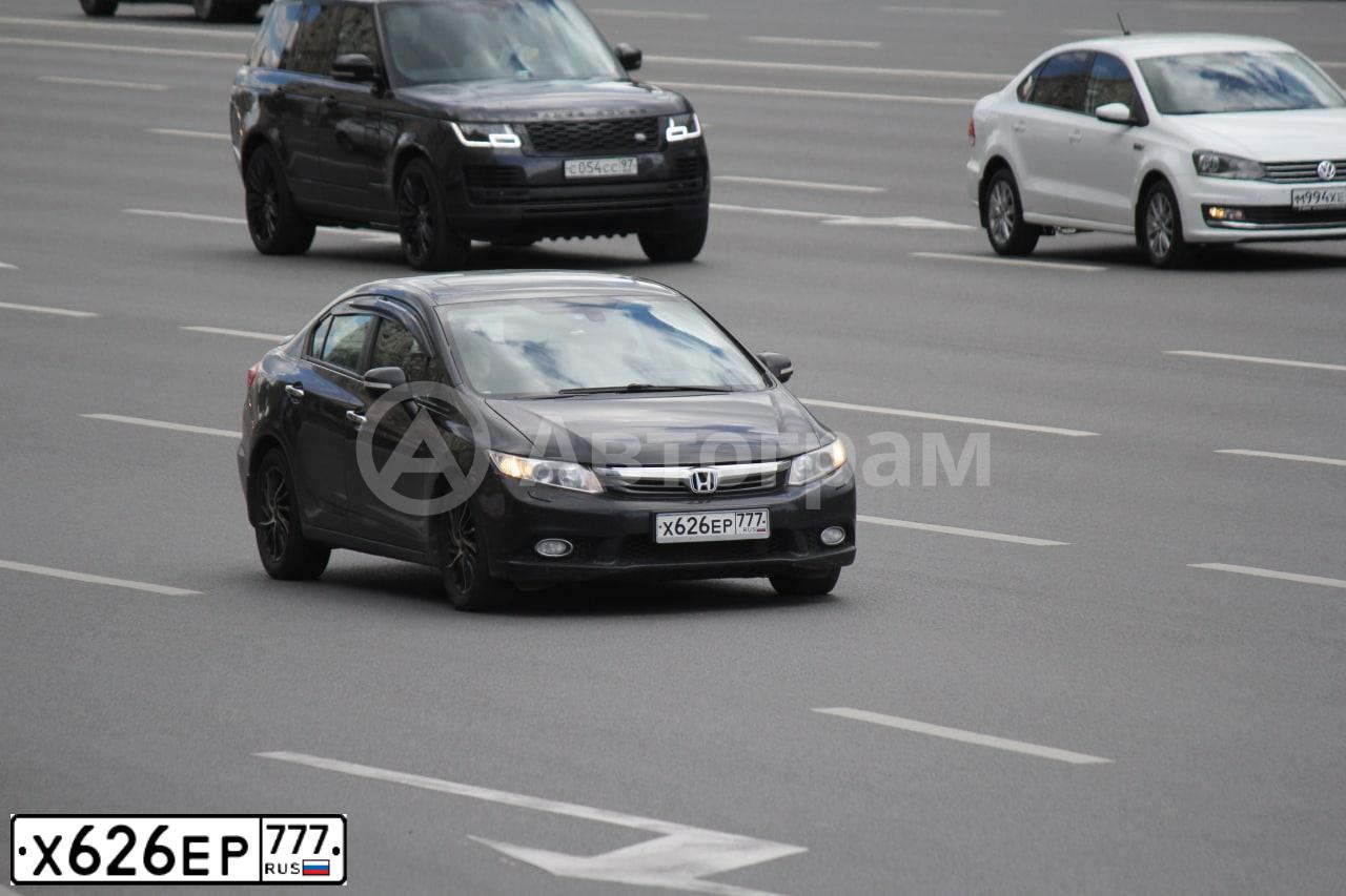 Фото автомобиля HONDA CIVIC, 2012 — госномер Н304СМ77. Цвет: ЧЕРНЫЙ