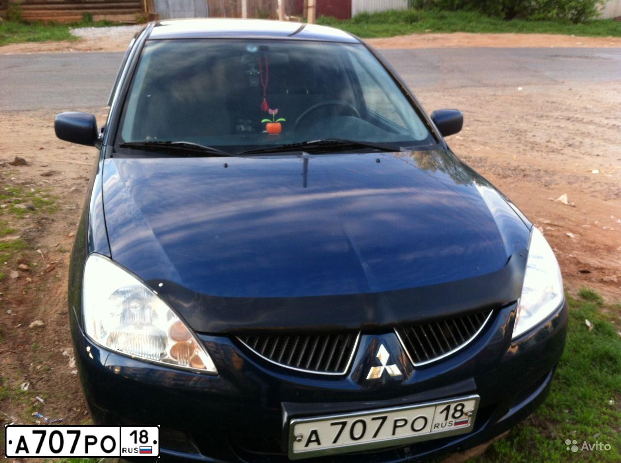 Фото автомобиля MITSUBISHI LANCER, 2004 — госномер О286МТ18. Цвет: синий